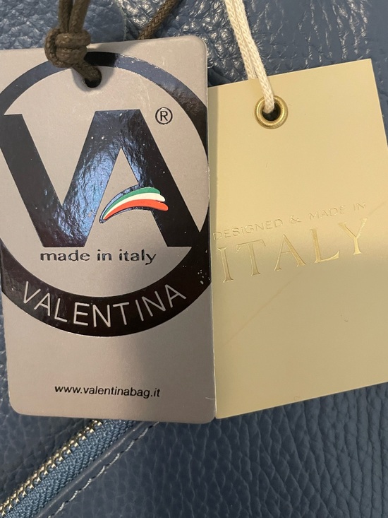 Valentina Italian pebbled leather convertible sling backpack
